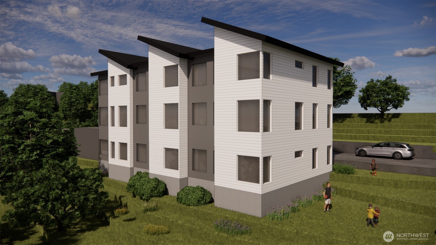 9419 Leroy Place South Seattle, WA 98118 - Photo 4 of 8 a white building view with a garden space