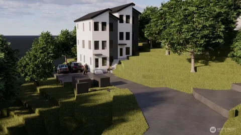 a view of a house with backyard porch and sitting area