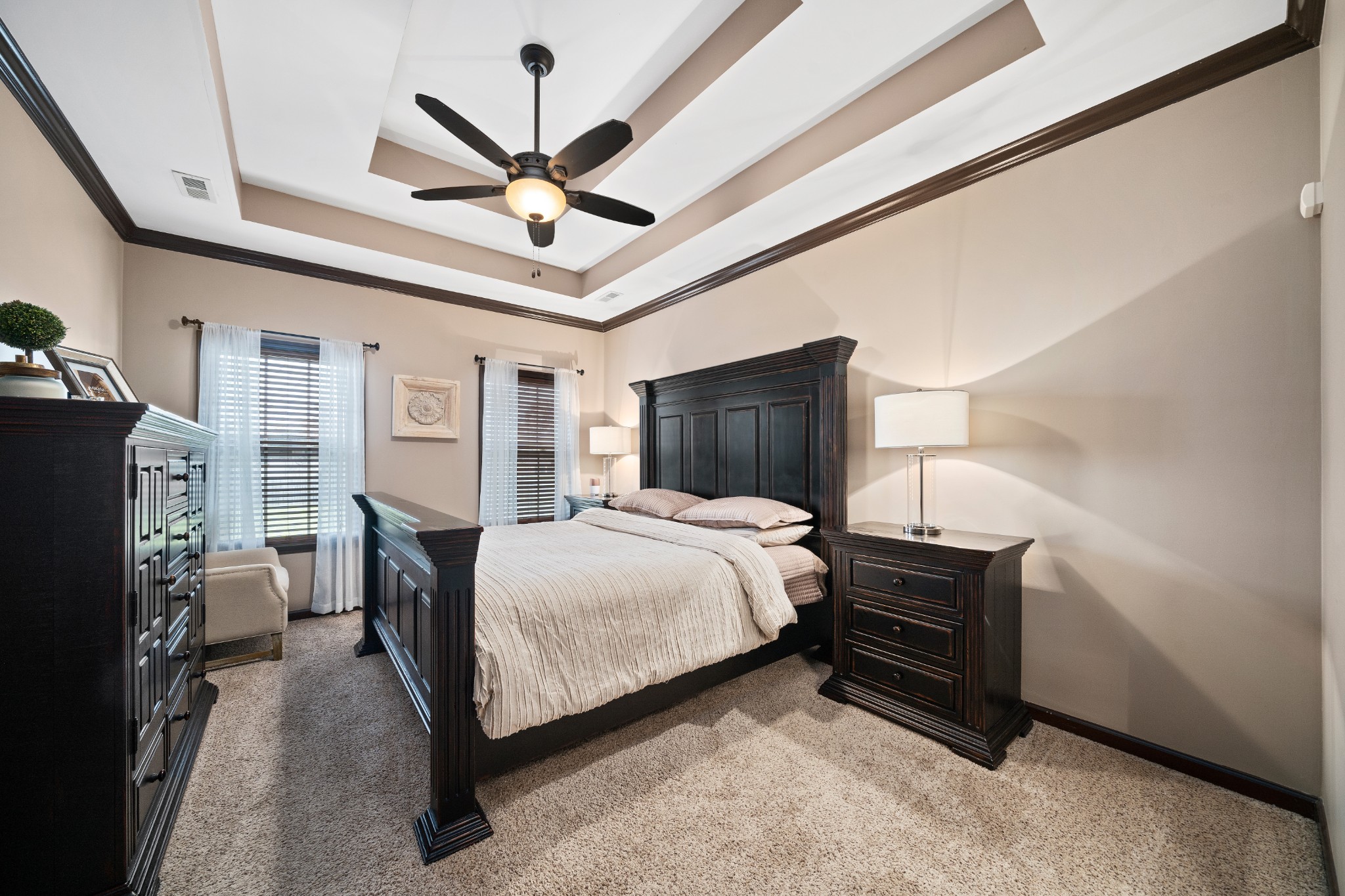 1439 Raven Road Clarksville, TN 37042 - Photo 17 of 28 a bedroom with a bed dresser and a ceiling fan