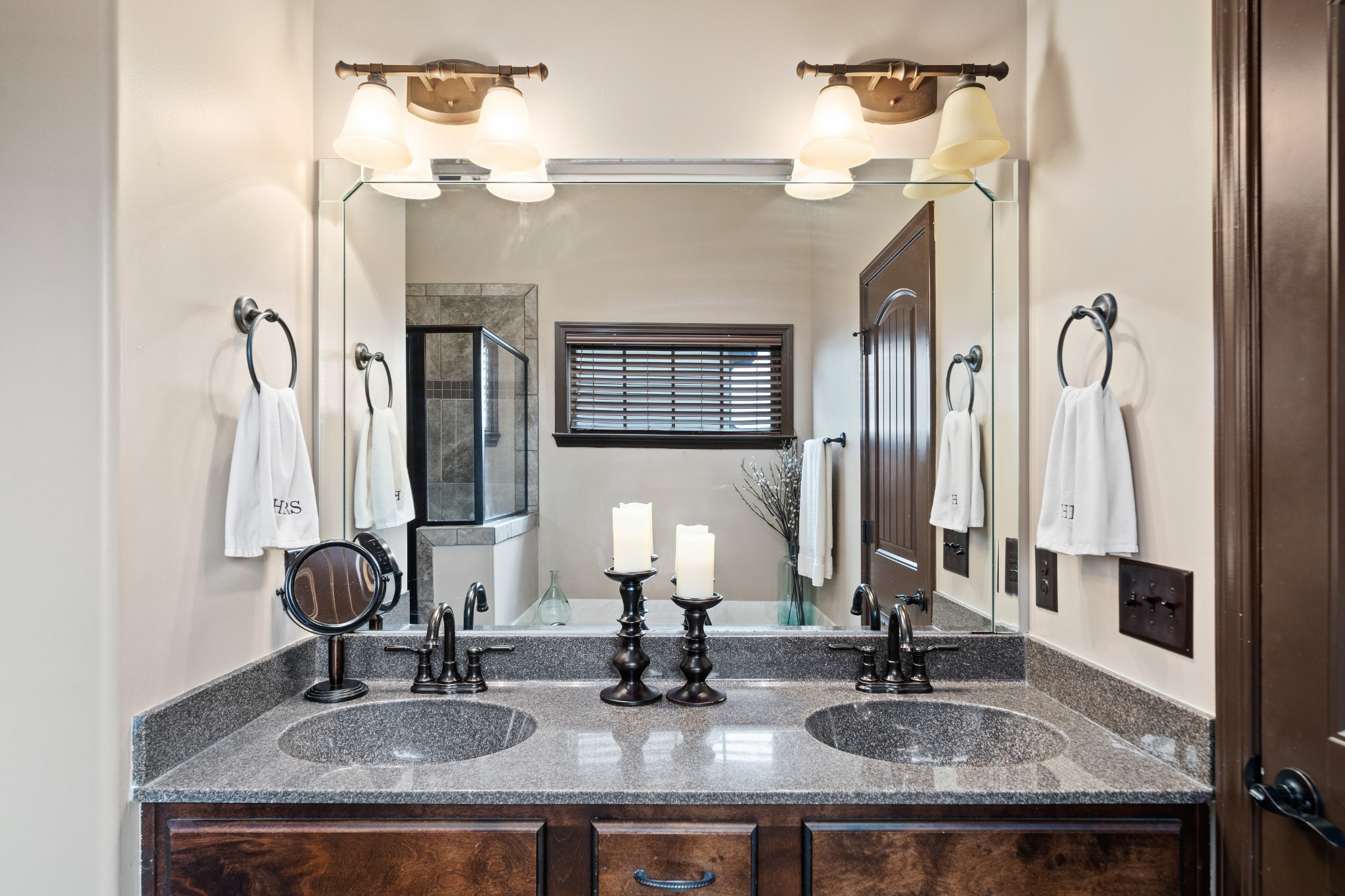 1439 Raven Road Clarksville, TN 37042 - Photo 20 of 28 a bathroom with a sink double vanity and a mirror