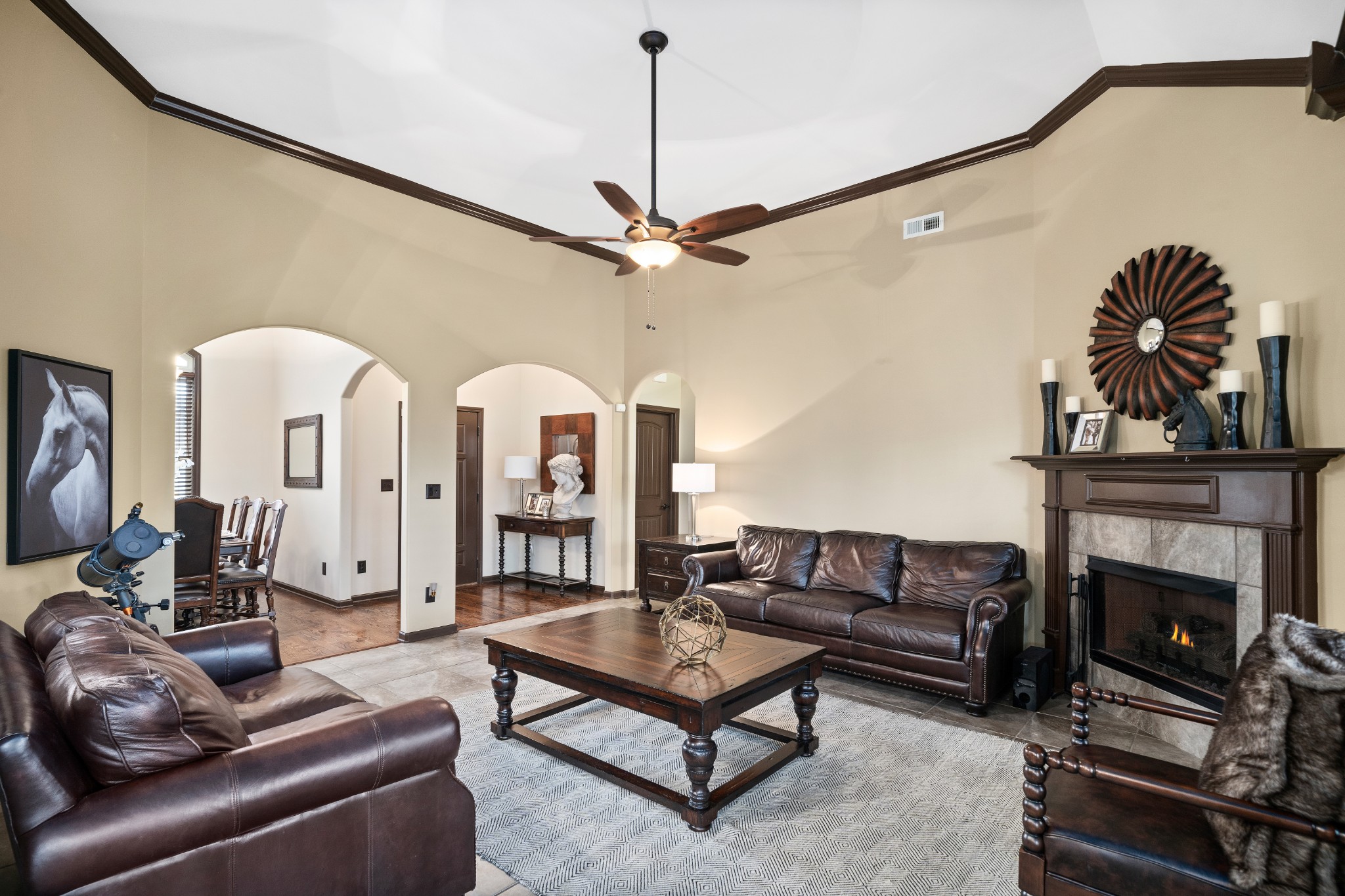 1439 Raven Road Clarksville, TN 37042 - Photo 5 of 28 a living room with furniture a ceiling fan and a fireplace