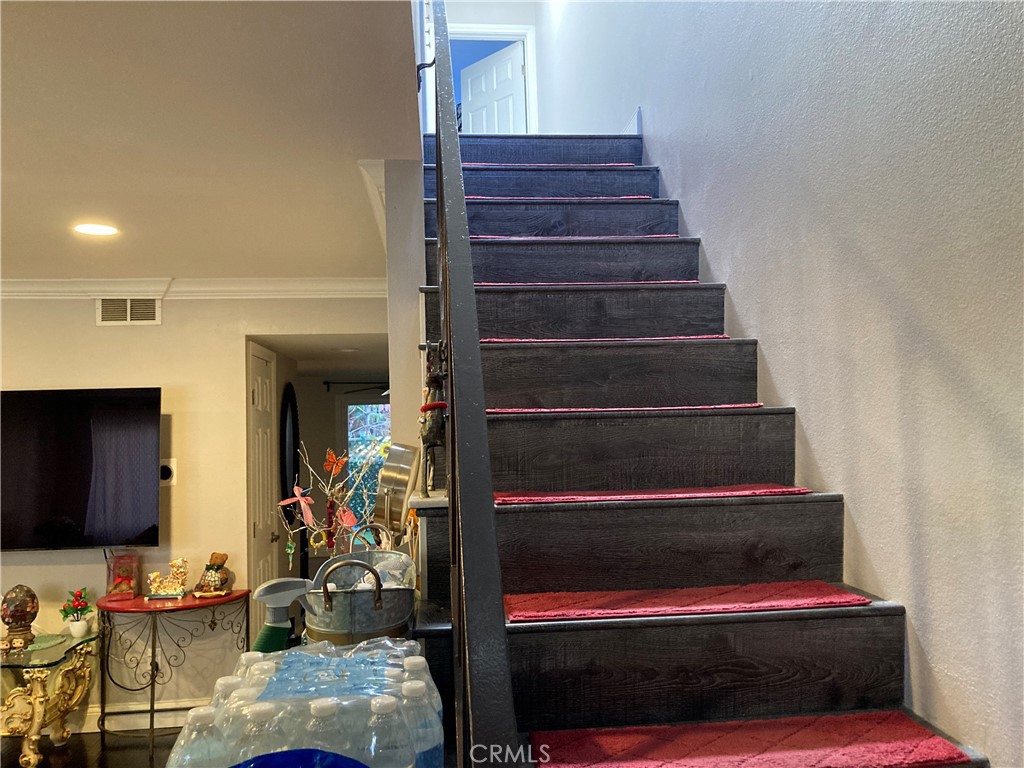 809 North Spurgeon Street, Unit 5 Santa Ana, CA 92701 - Photo 9 of 12 a view of entryway and hall with wooden floor