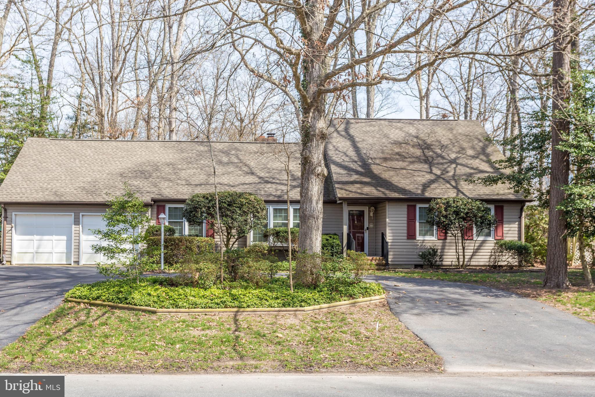 17 Kingsbridge Road Rehoboth Beach, DE 19971 - Photo 1 of 24 Asphalt horseshoe driveway and spacious parking