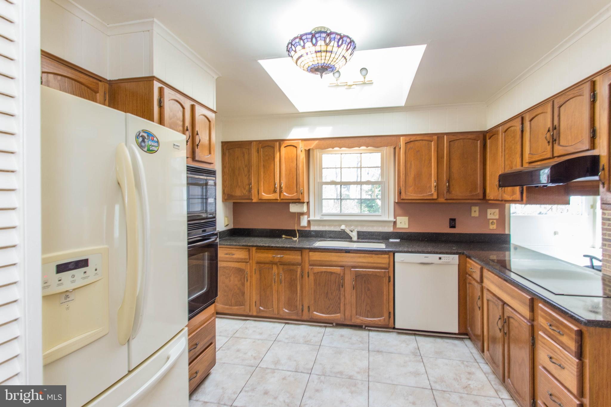 17 Kingsbridge Road Rehoboth Beach, DE 19971 - Photo 2 of 24 Custom cabinets and tile floor