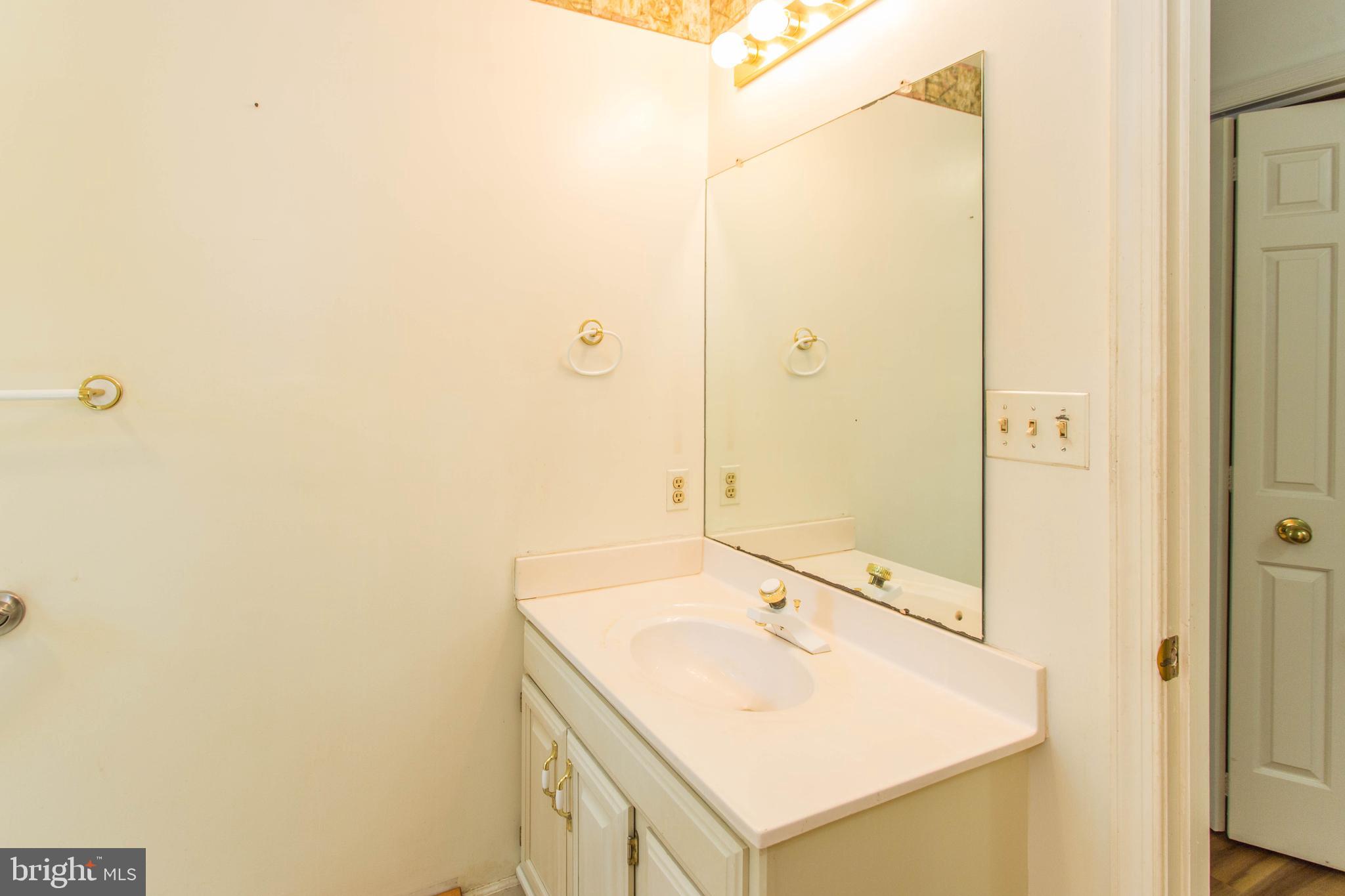 17 Kingsbridge Road Rehoboth Beach, DE 19971 - Photo 12 of 24 First Floor Guest bath vanity