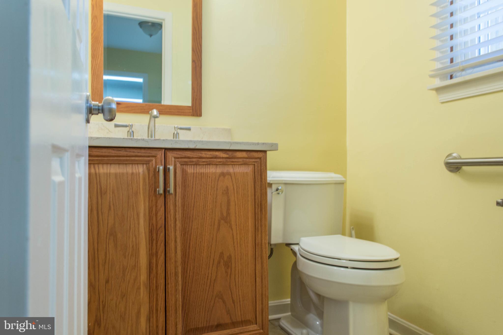 17 Kingsbridge Road Rehoboth Beach, DE 19971 - Photo 18 of 24 First floor Powder Room adjoining Laundry Room