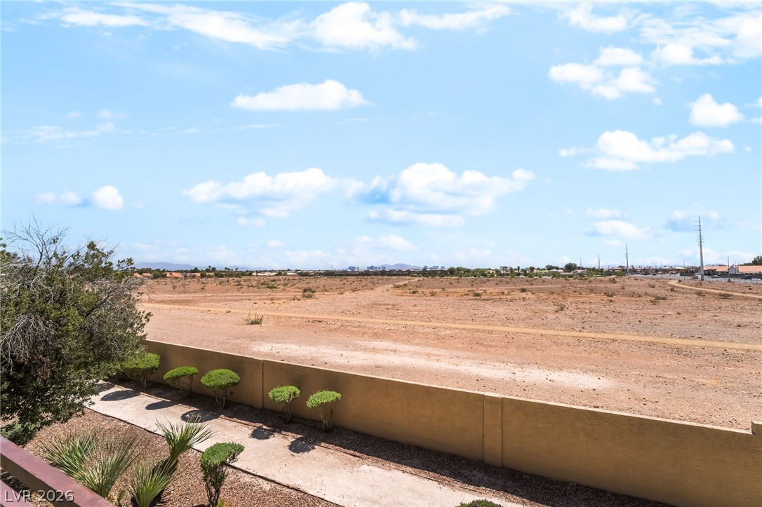 8070 West Russell Road, Unit 2024 Las Vegas, NV 89113 - Photo 17 of 19 A spacious, undeveloped desert landscape awaits, offering boundless possibilities for your future vision.