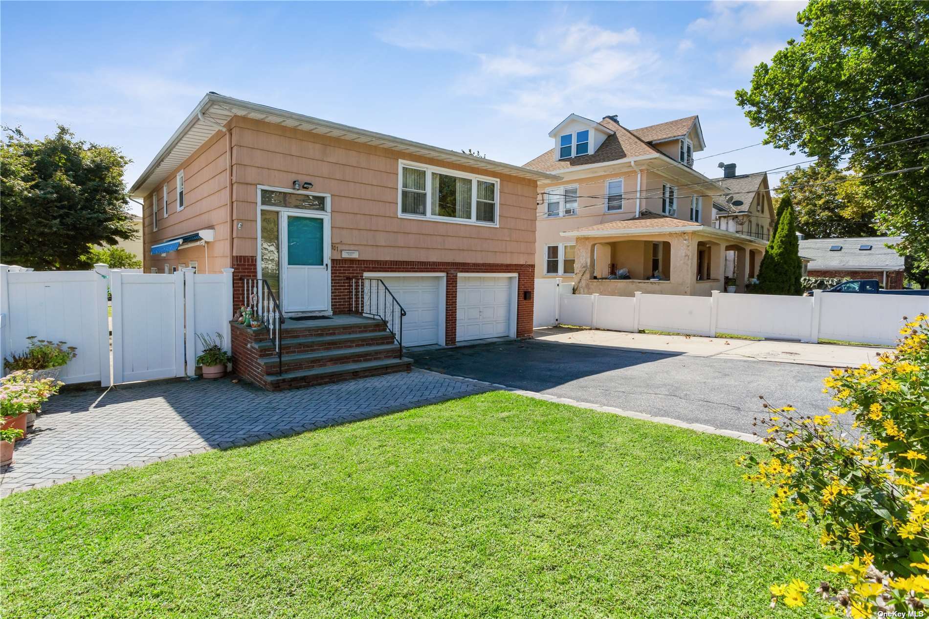 101 Landing Road Glen Cove, NY 11542 - Photo 1 of 1 a front view of house with yard and green space