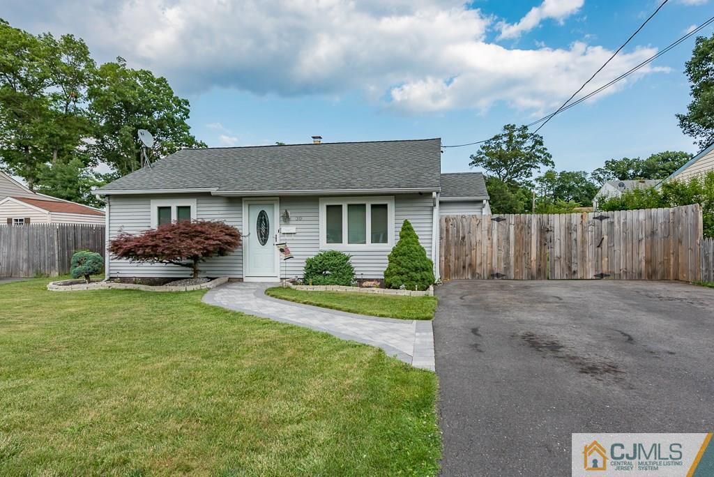 30 Crescent Road Edison, NJ 08817 - Photo 22 of 22 a front view of a house with garden