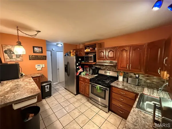 $215,000 | 1345 Hialeah Place, Florissant, MO 63033