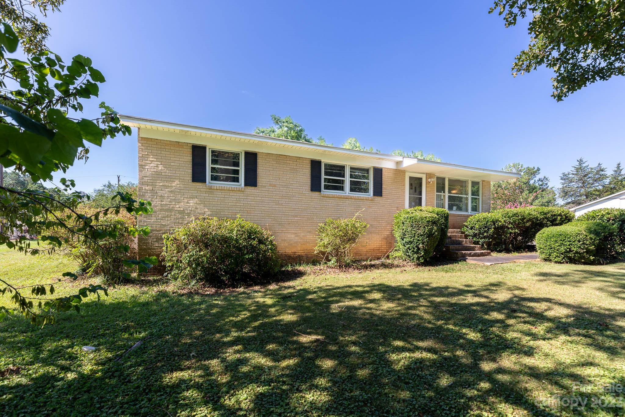 1494 Shiloh Unity Road Lancaster, SC 29720 - Photo 15 of 23 a front view of a house with a yard