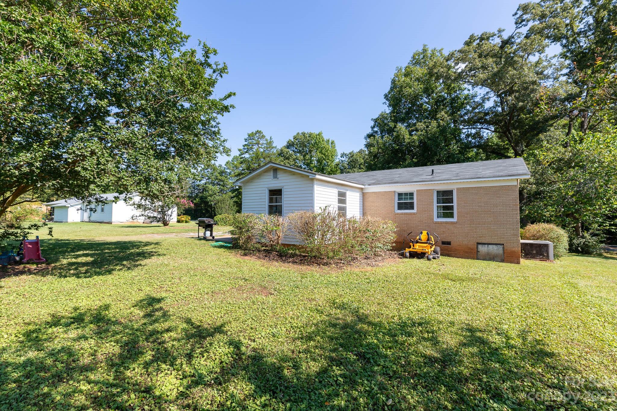 1494 Shiloh Unity Road Lancaster, SC 29720 - Photo 16 of 23 a view of a house with a backyard