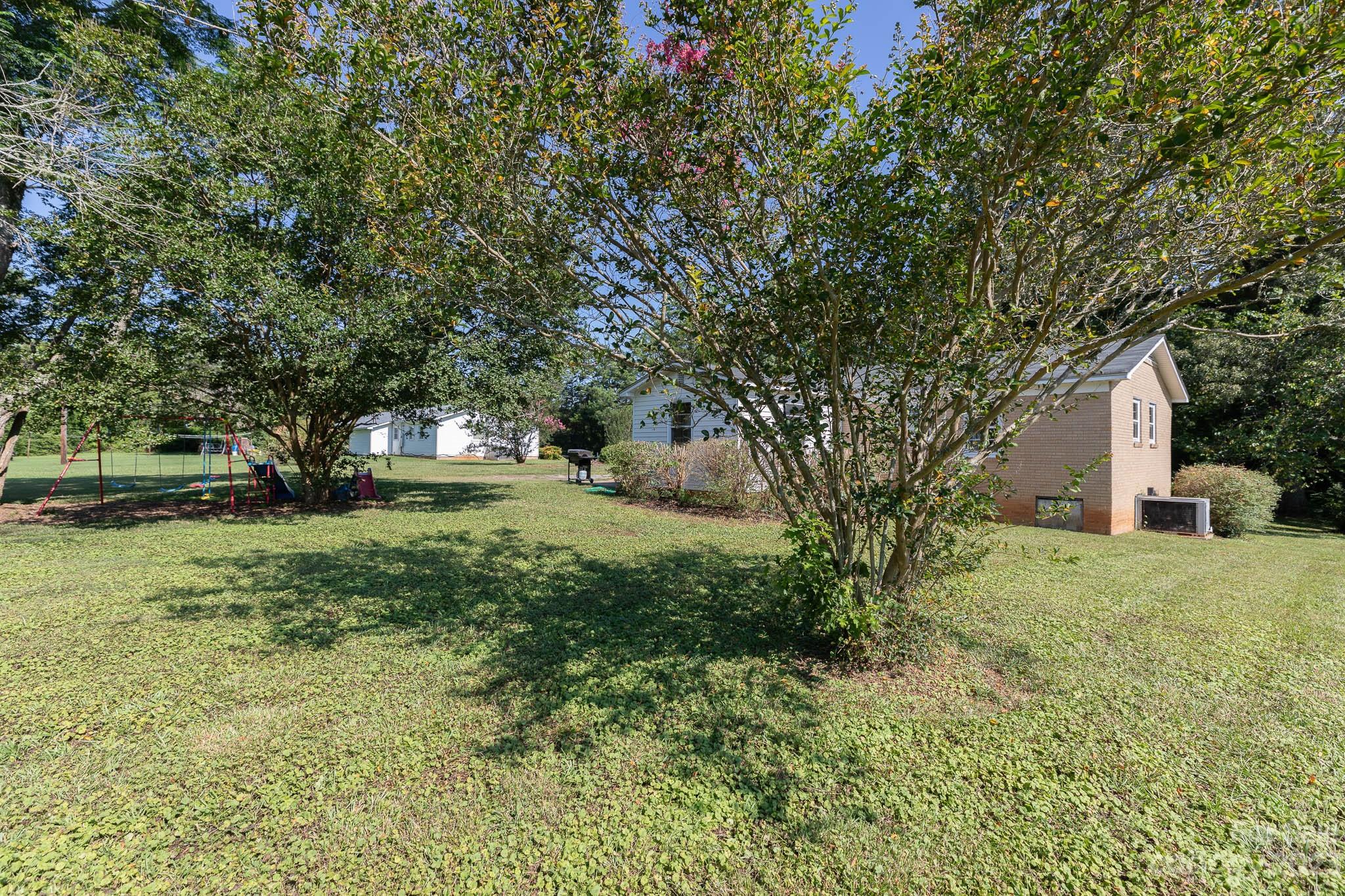 1494 Shiloh Unity Road Lancaster, SC 29720 - Photo 19 of 23 a front view of a house with a yard