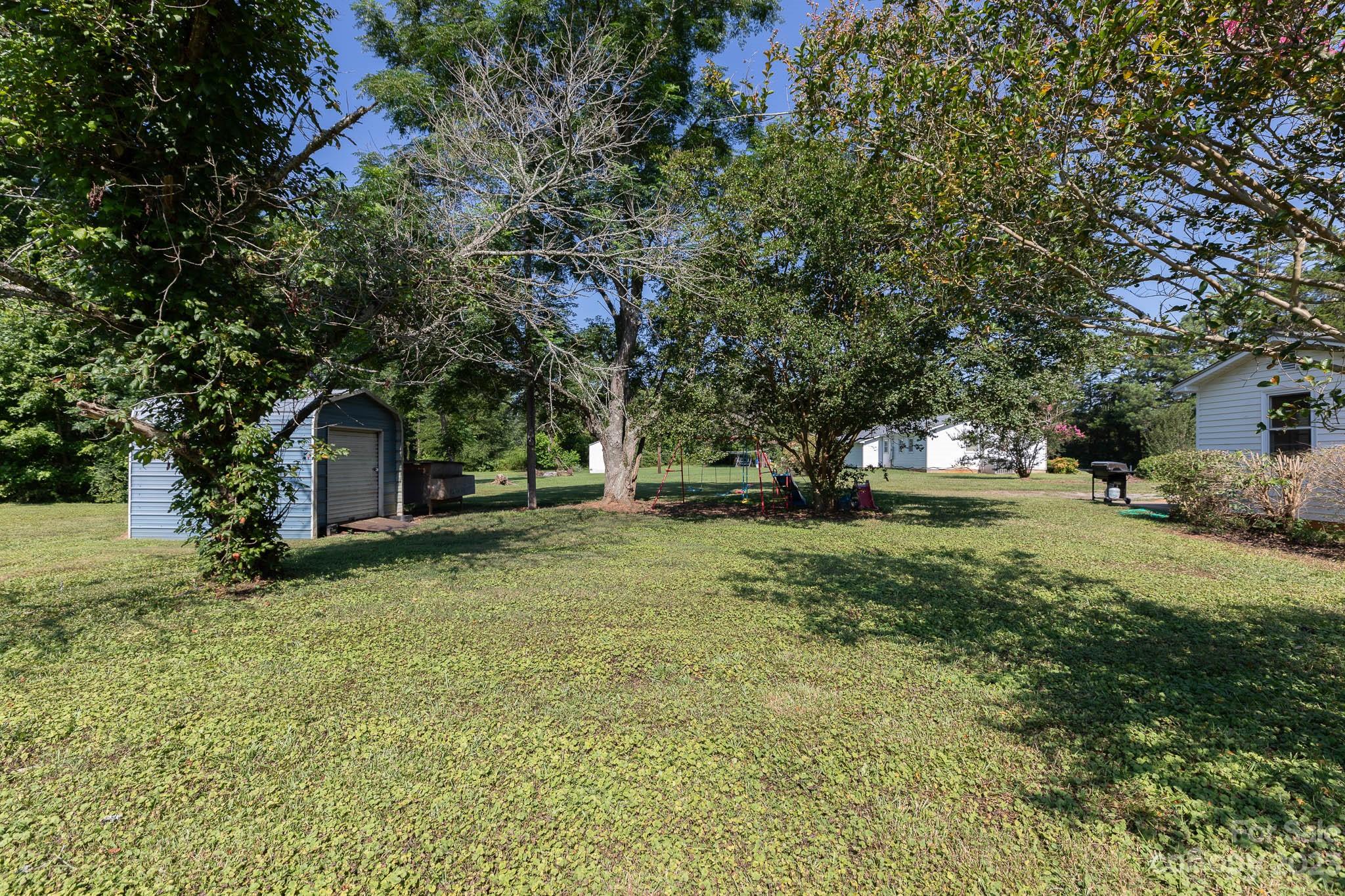 1494 Shiloh Unity Road Lancaster, SC 29720 - Photo 3 of 23 a view of a house with a yard