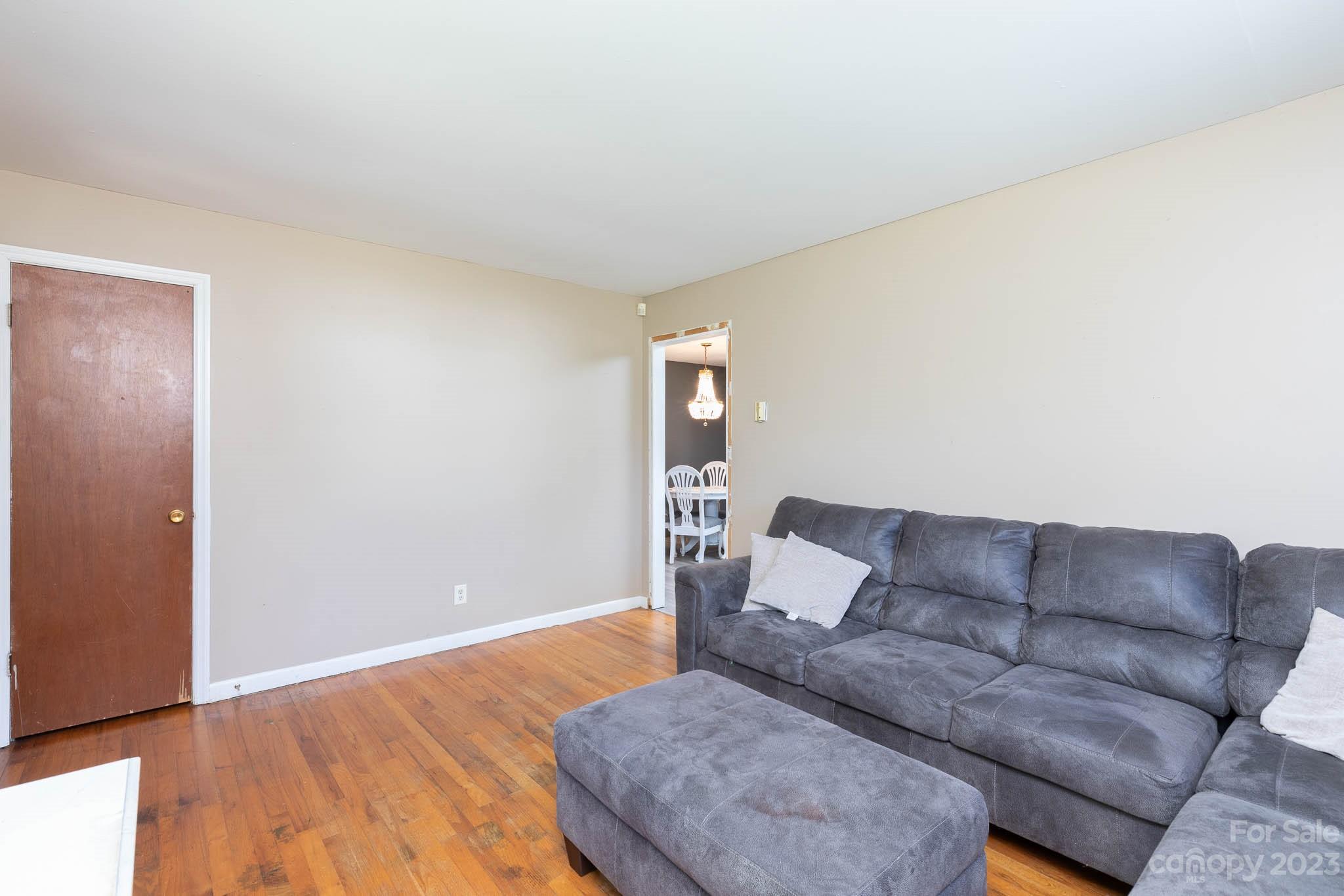 1494 Shiloh Unity Road Lancaster, SC 29720 - Photo 5 of 23 a living room with furniture and a wooden floor