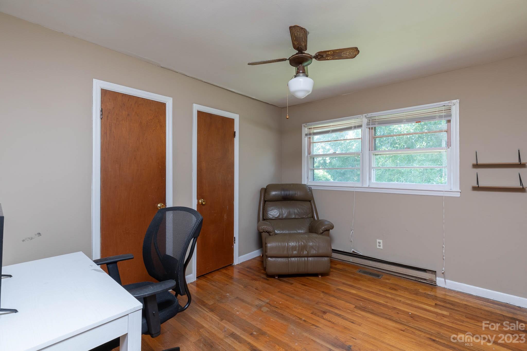 1494 Shiloh Unity Road Lancaster, SC 29720 - Photo 10 of 23 a view of workspace with wooden floor windows