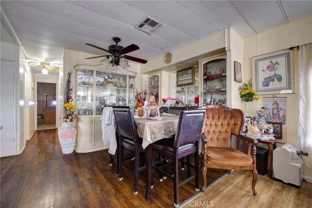 3700 Buchanan Street, Unit 180 Riverside, CA 92503 - Photo 11 of 23 a view of a dining room with furniture and chandelier