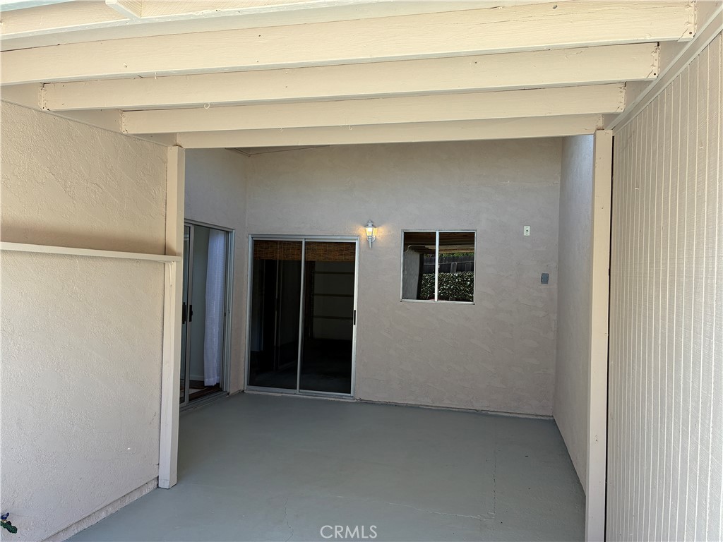 517 Queenanne Road Paso Robles, CA 93446 - Photo 13 of 18 Back yard patio area. Doors access the garage and the home. Perfect for folks who like to spend time outdoors!!