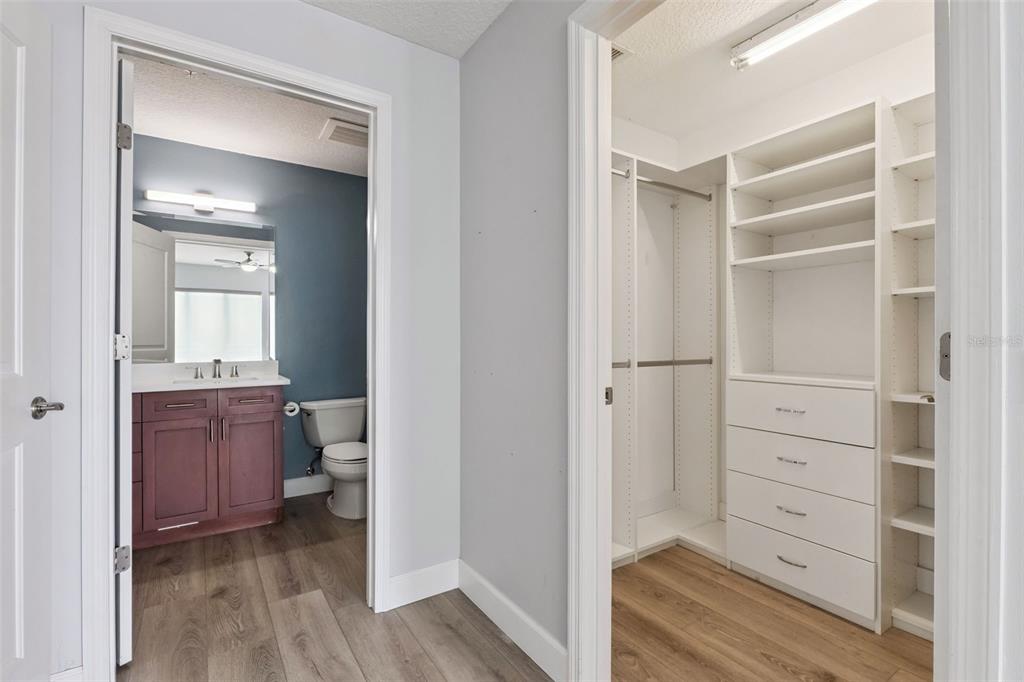 100 South Eola Drive, Unit 911 Orlando, FL 32801 - Photo 26 of 53 a view of walk in closet with wooden floor