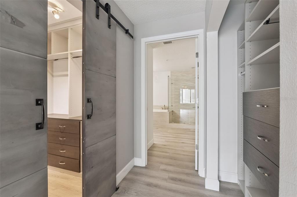 100 South Eola Drive, Unit 911 Orlando, FL 32801 - Photo 30 of 53 a bathroom with a shower and a glass door