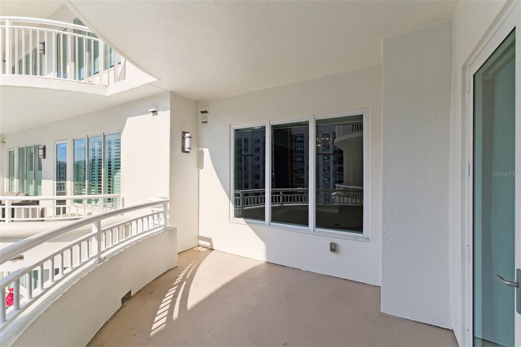 100 South Eola Drive, Unit 911 Orlando, FL 32801 - Photo 33 of 53 a view of a large white house with a large window