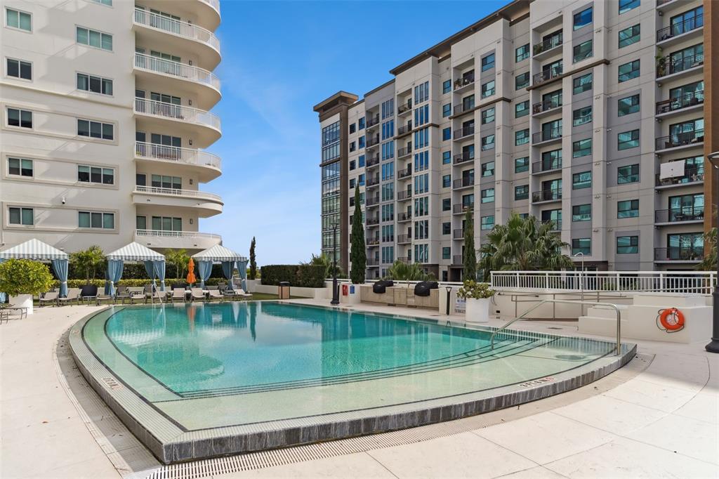 100 South Eola Drive, Unit 911 Orlando, FL 32801 - Photo 39 of 53 a view of a swimming pool with outdoor seating