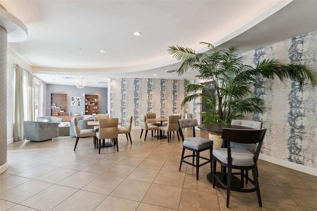 100 South Eola Drive, Unit 911 Orlando, FL 32801 - Photo 45 of 53 a living room with furniture and a potted plant
