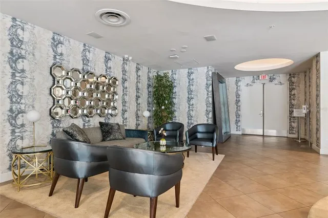 a kitchen with a table and chairs in it