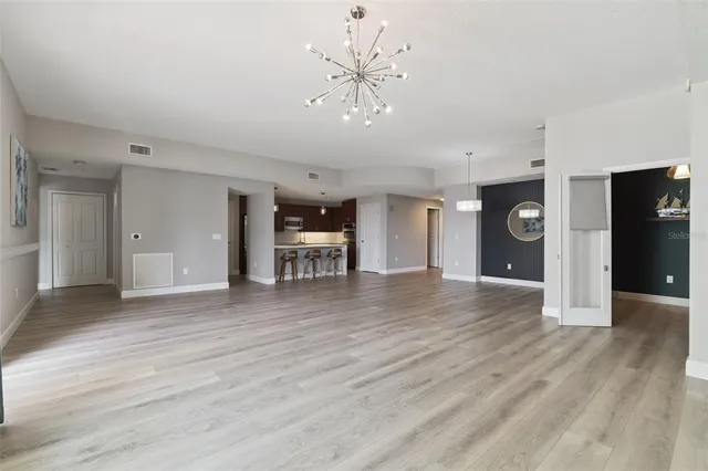 a view of front door with wooden floor