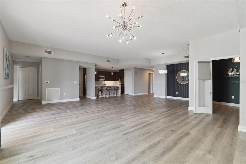100 South Eola Drive, Unit 911 Orlando, FL 32801 - Photo 8 of 53 a view of a livingroom with wooden floor