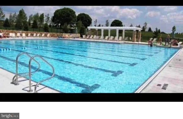 a view of an outdoor space and swimming pool