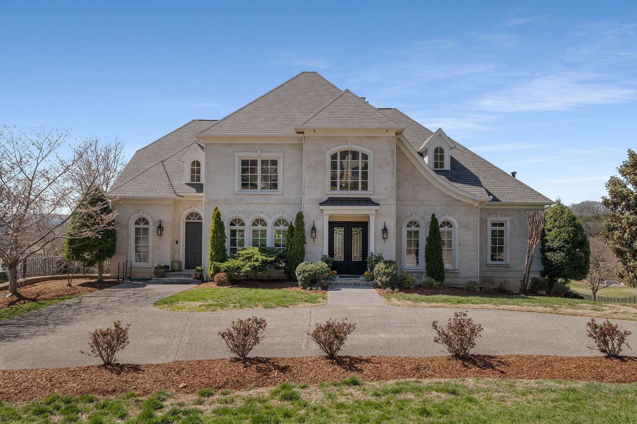 673 Legends Crest Drive Franklin, TN 37069 - Photo 1 of 81 a front view of a house with a yard
