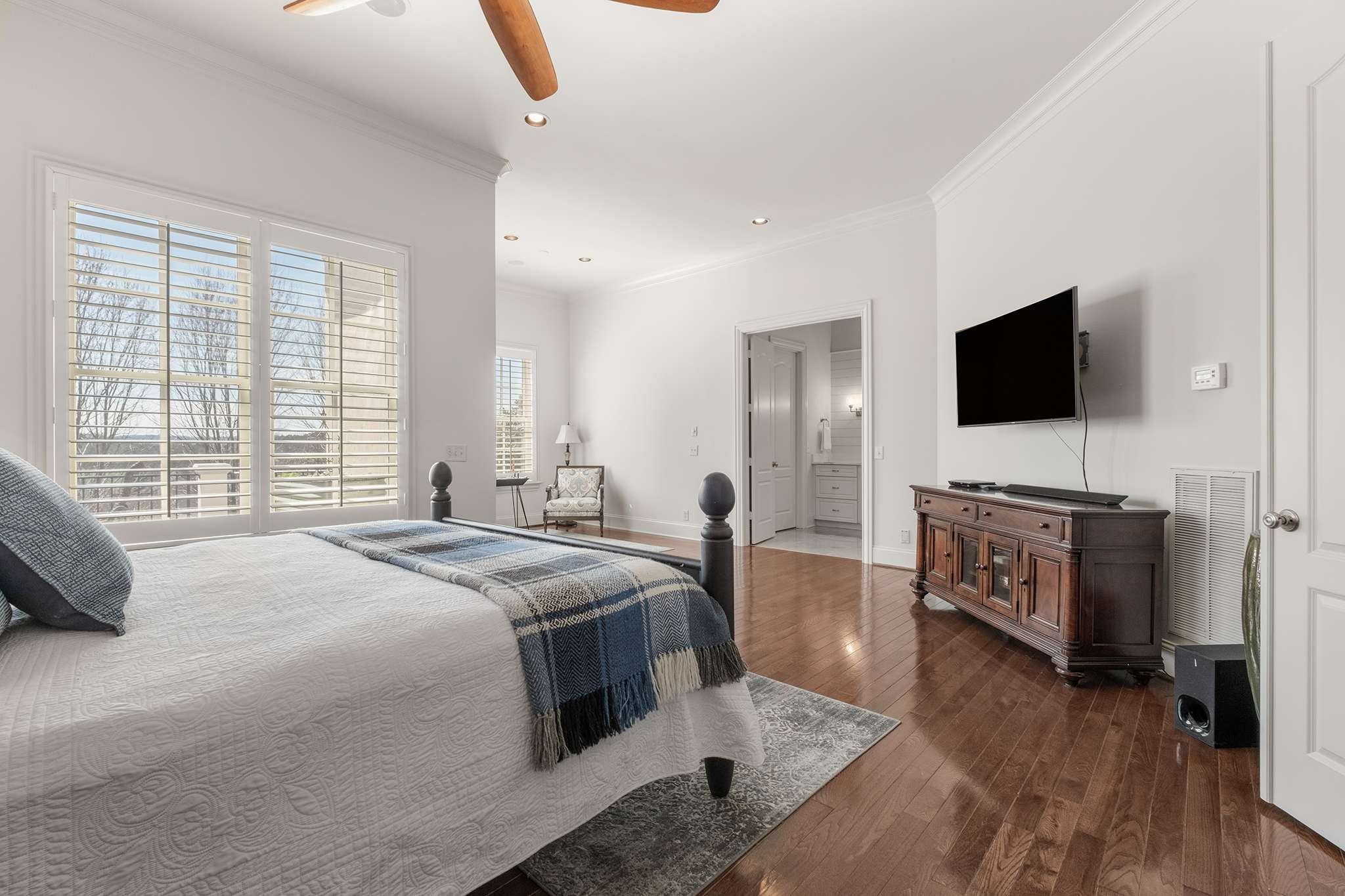 673 Legends Crest Drive Franklin, TN 37069 - Photo 27 of 81 a spacious bedroom with a bed and a television