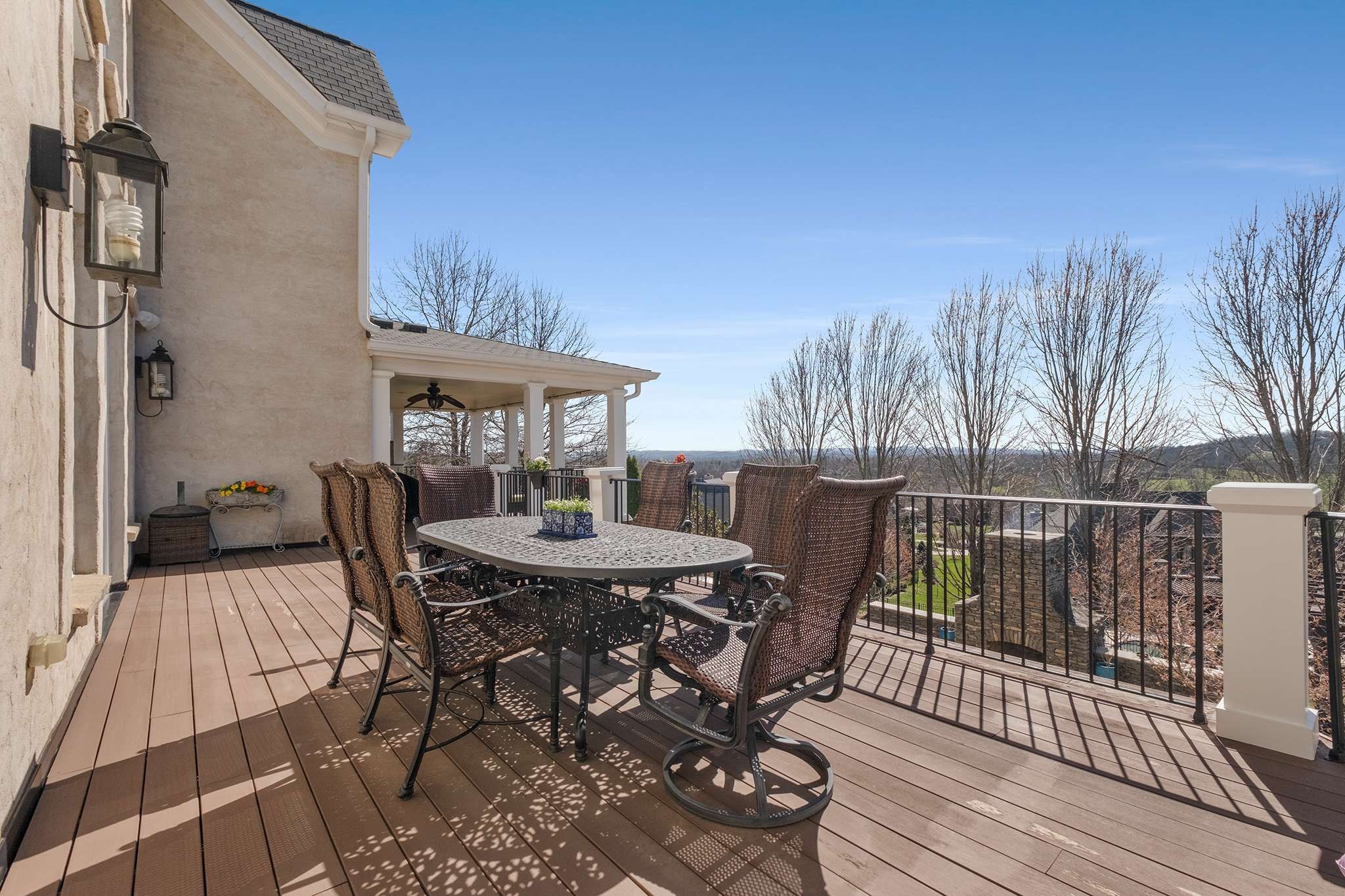 673 Legends Crest Drive Franklin, TN 37069 - Photo 34 of 81 a view of a roof deck with table and chairs with wooden floor and fence