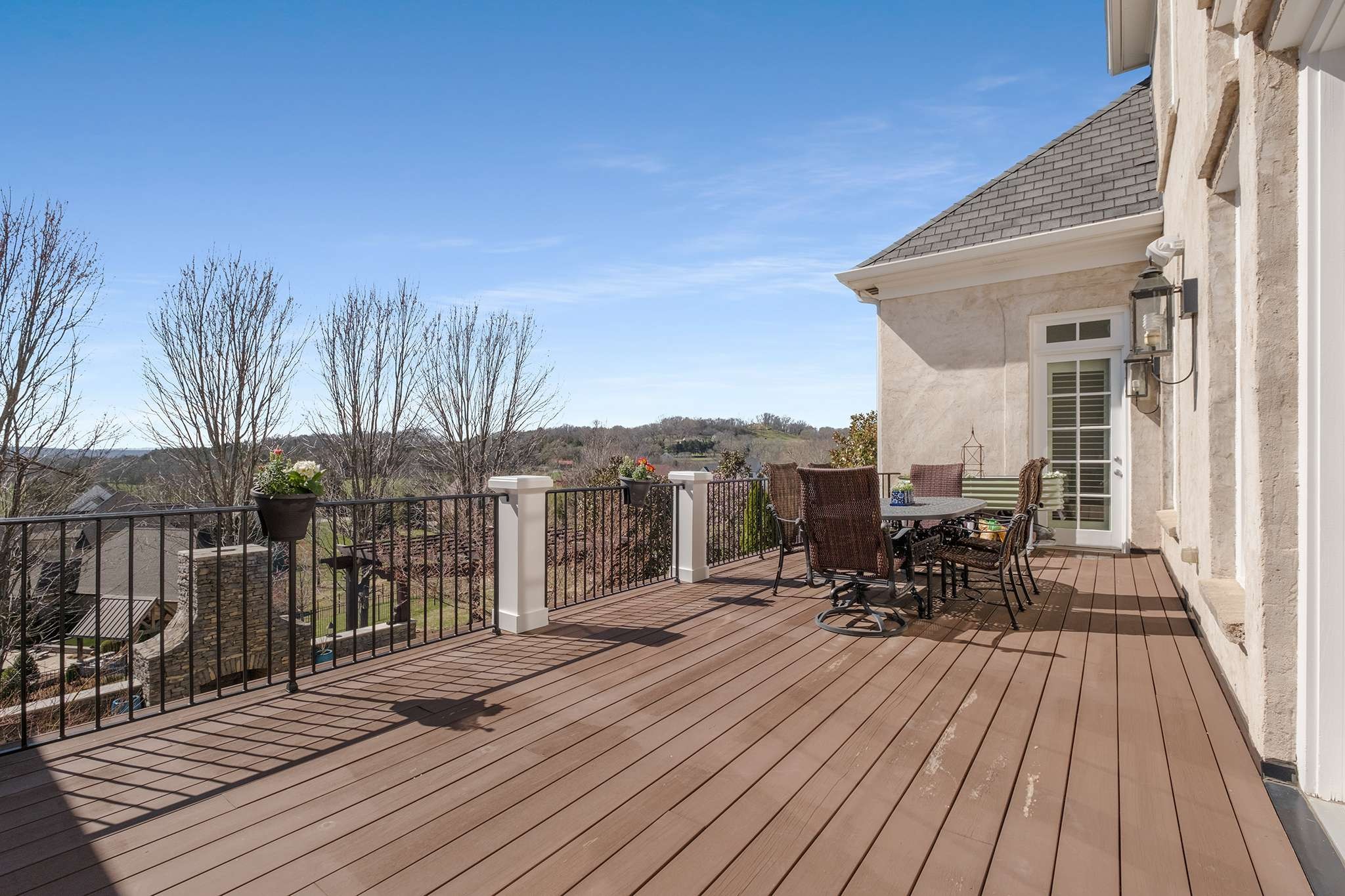 673 Legends Crest Drive Franklin, TN 37069 - Photo 38 of 81 a view of a rooftop deck with chairs and wooden floor