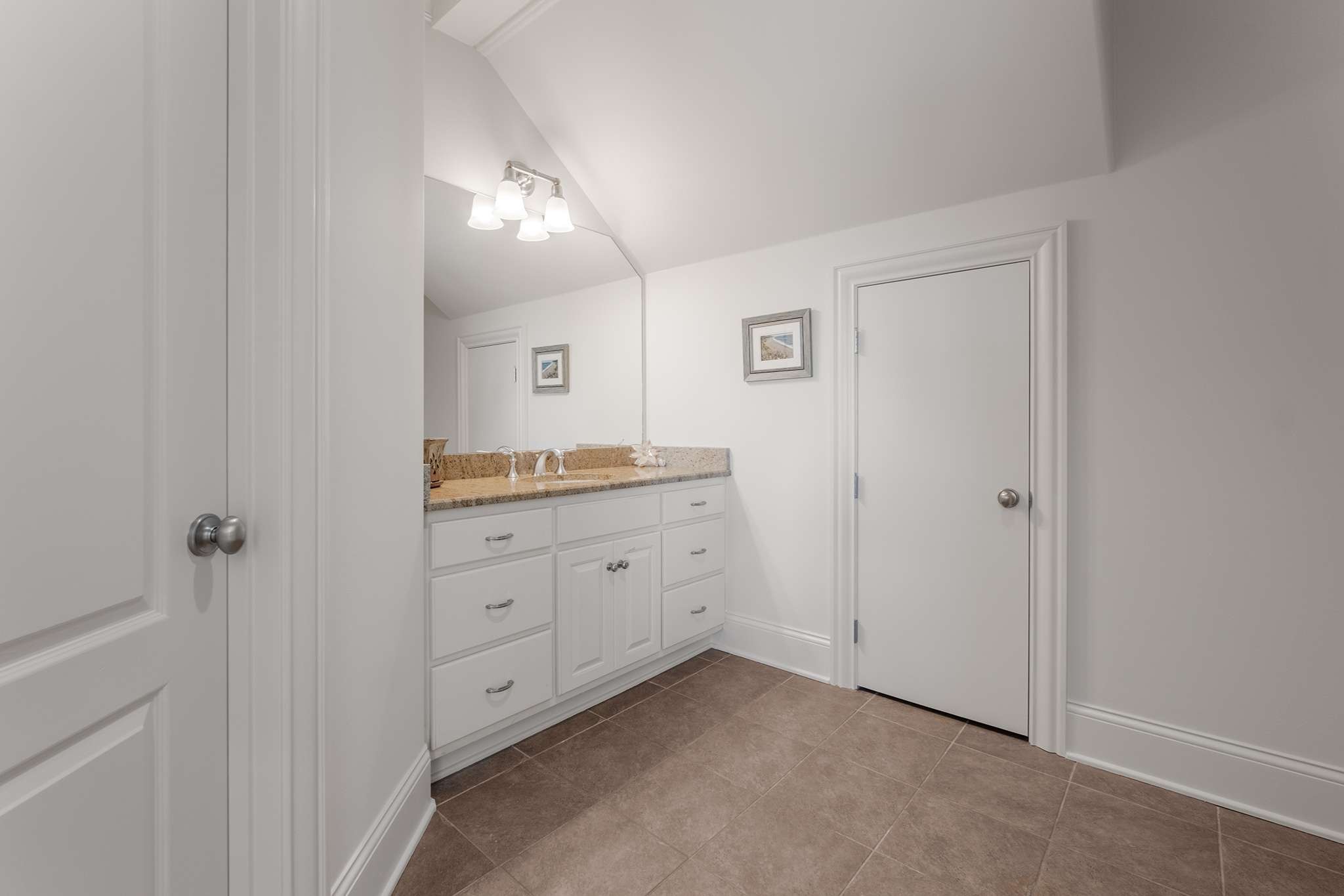 673 Legends Crest Drive Franklin, TN 37069 - Photo 44 of 81 a spacious bathroom with a granite countertop sink and mirror