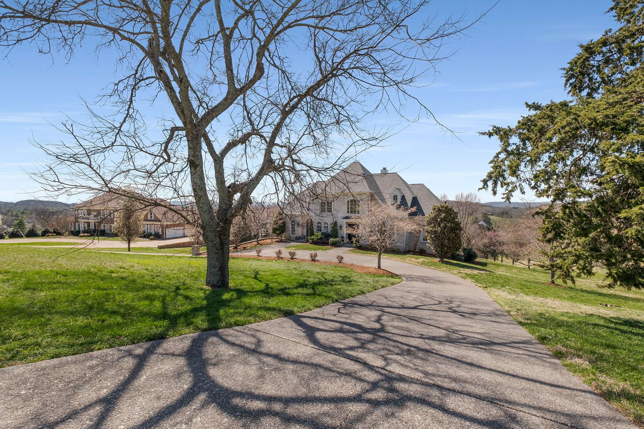 673 Legends Crest Drive Franklin, TN 37069 - Photo 5 of 81 a pathway of a yard with large trees