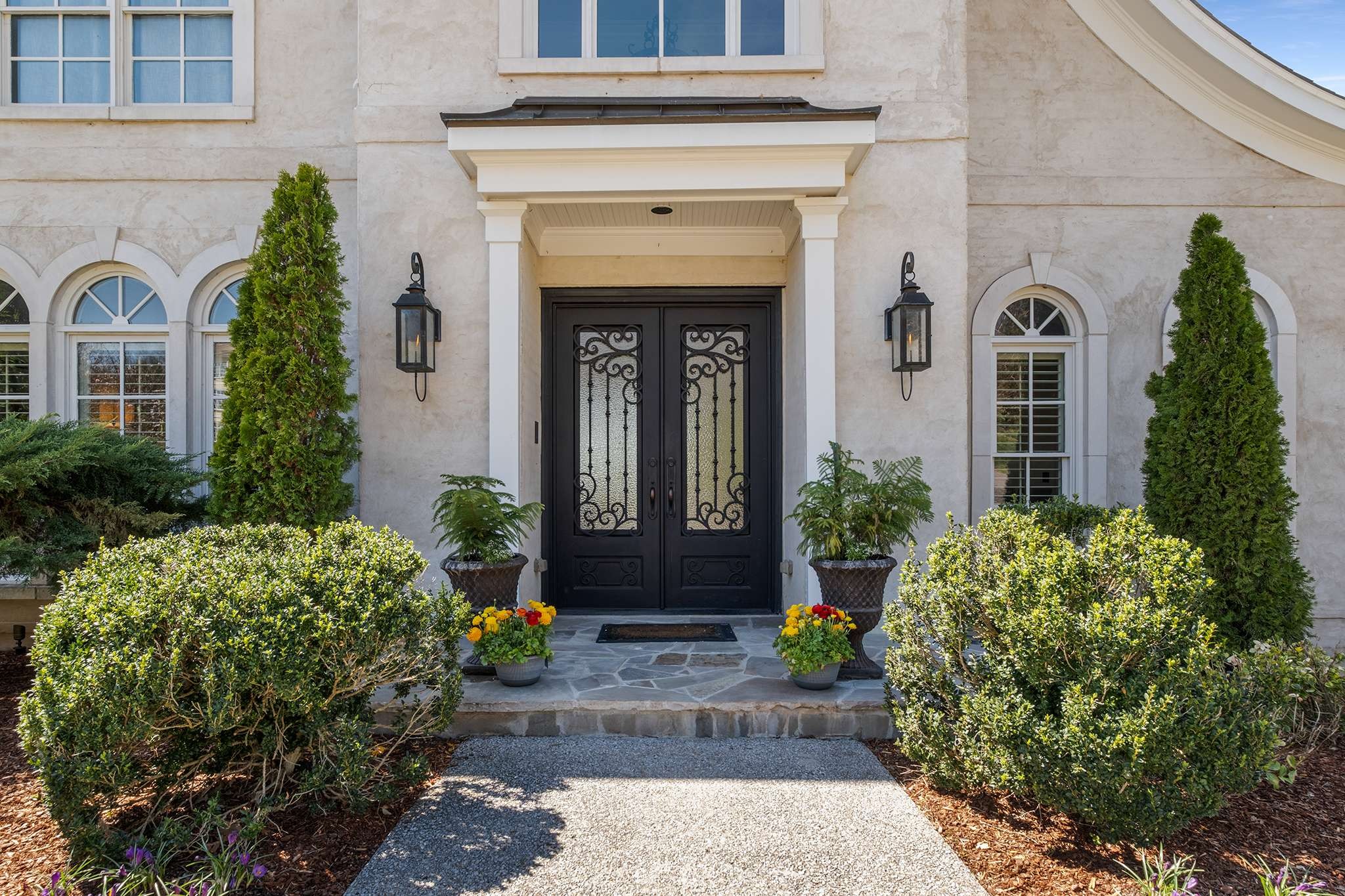 673 Legends Crest Drive Franklin, TN 37069 - Photo 6 of 81 a front view of a house with garden