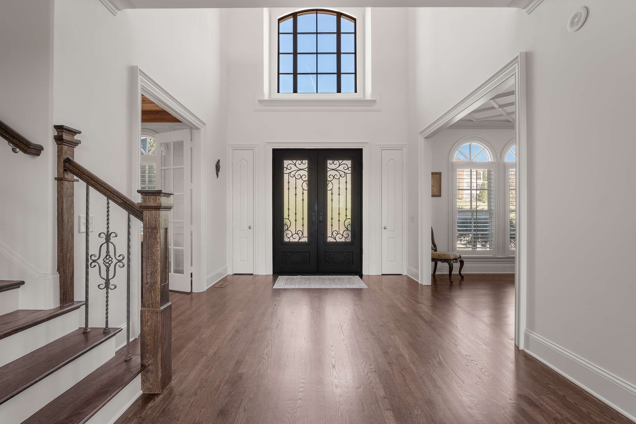 673 Legends Crest Drive Franklin, TN 37069 - Photo 8 of 81 a view of an entryway with wooden floor and a livingroom