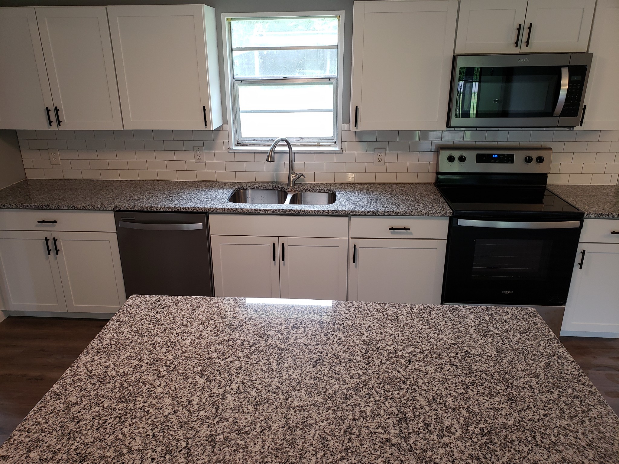 814 Miles Road Pulaski, TN 38478 - Photo 11 of 35 a kitchen with a sink stove and microwave