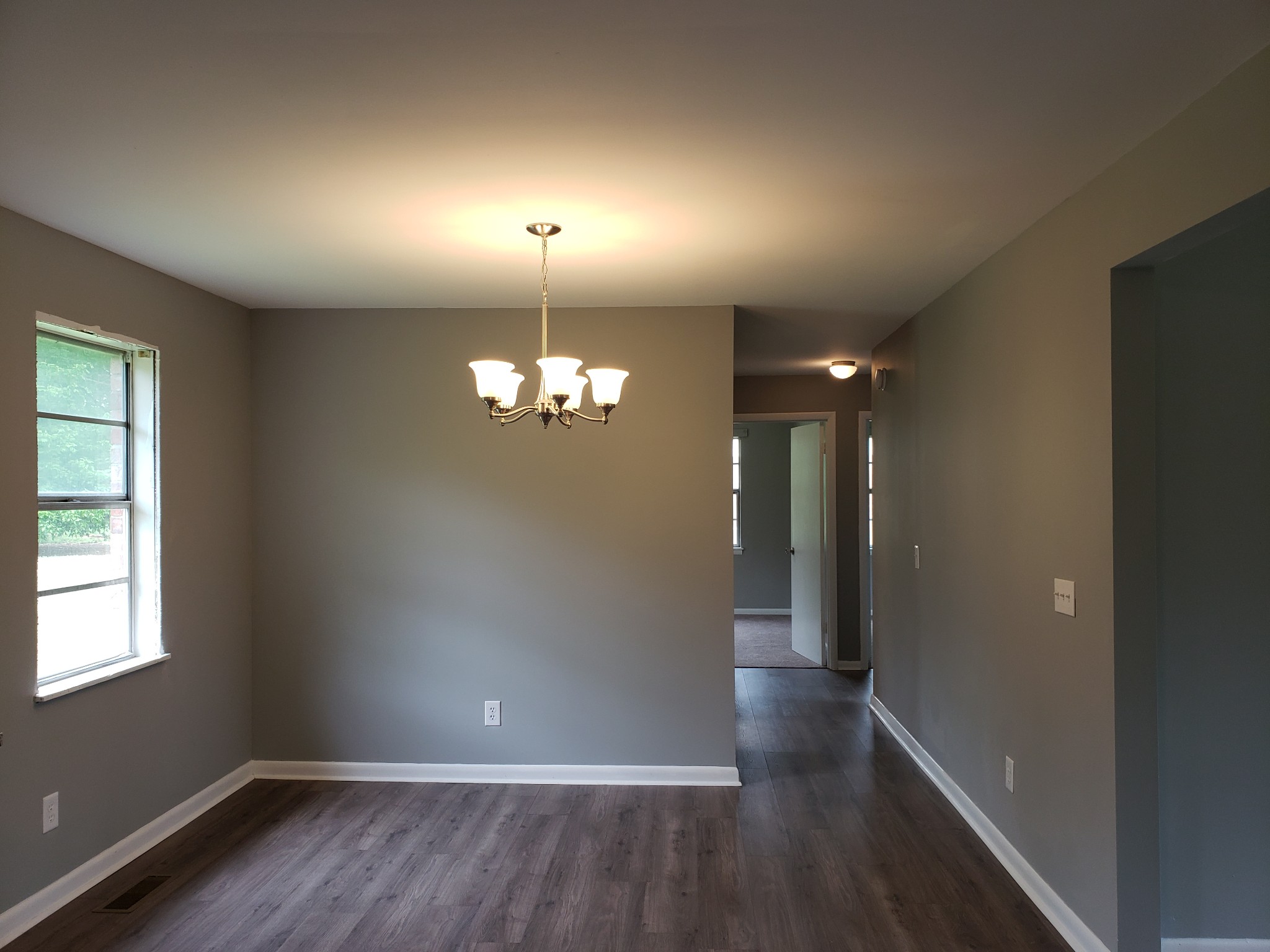 814 Miles Road Pulaski, TN 38478 - Photo 18 of 35 wooden floor in an empty room with a window