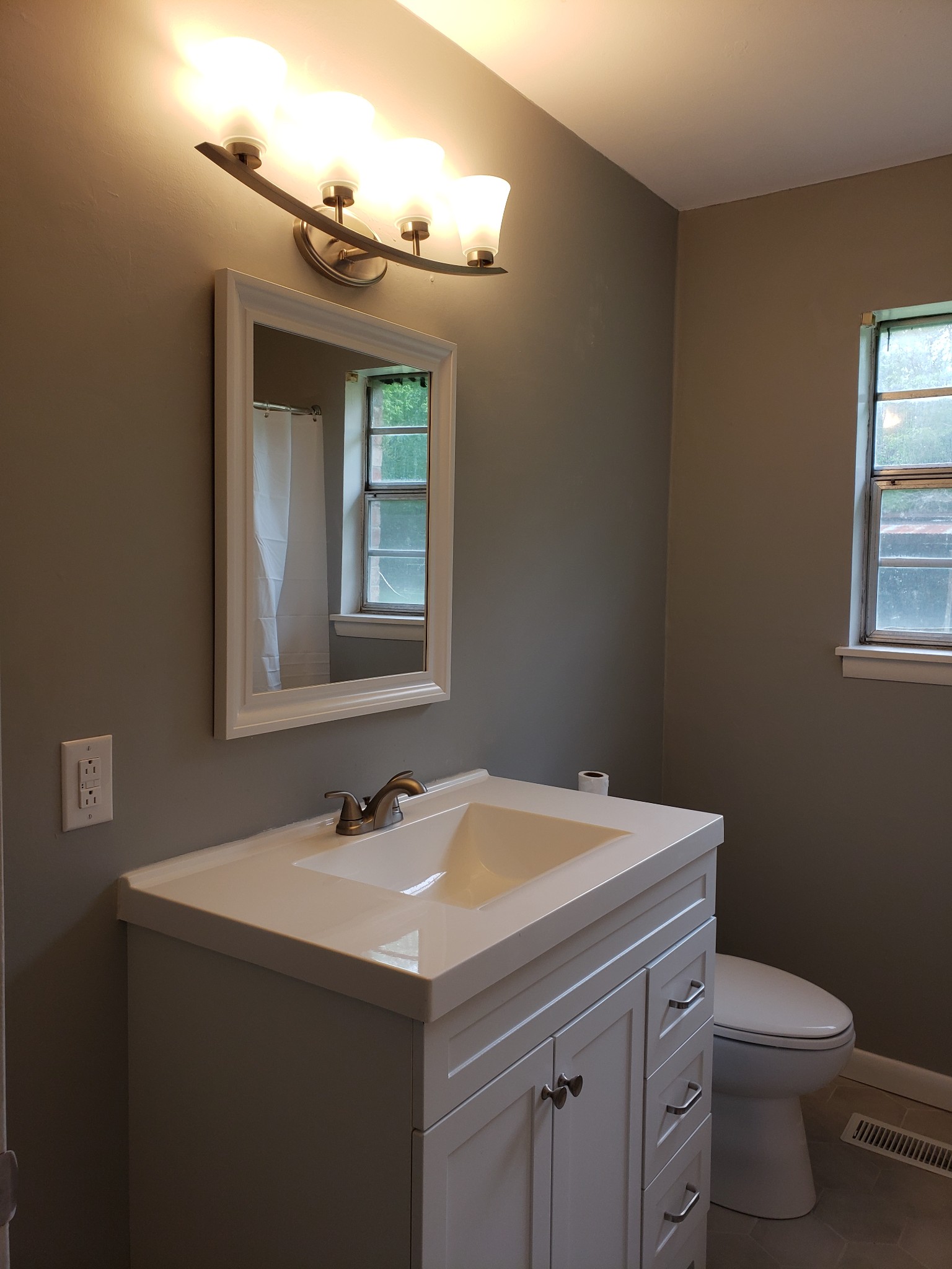 814 Miles Road Pulaski, TN 38478 - Photo 20 of 35 a bathroom with a sink toilet and mirror