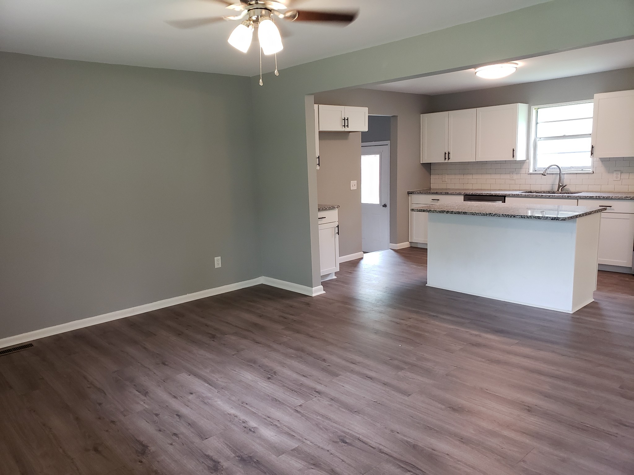 814 Miles Road Pulaski, TN 38478 - Photo 5 of 35 a view of kitchen with granite countertop cabinets and refrigerator