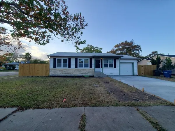 a view of a house with a garden