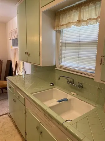 a bathroom with a sink and a bathtub