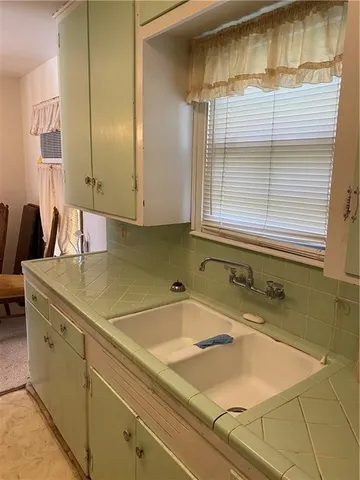 a bathroom with a sink and a bathtub