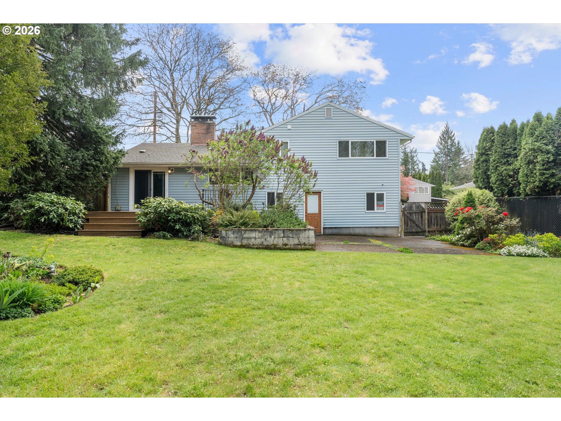 3235 Southeast Silver Springs Road Milwaukie, OR 97222 - Photo 28 of 32 a house view with a garden space