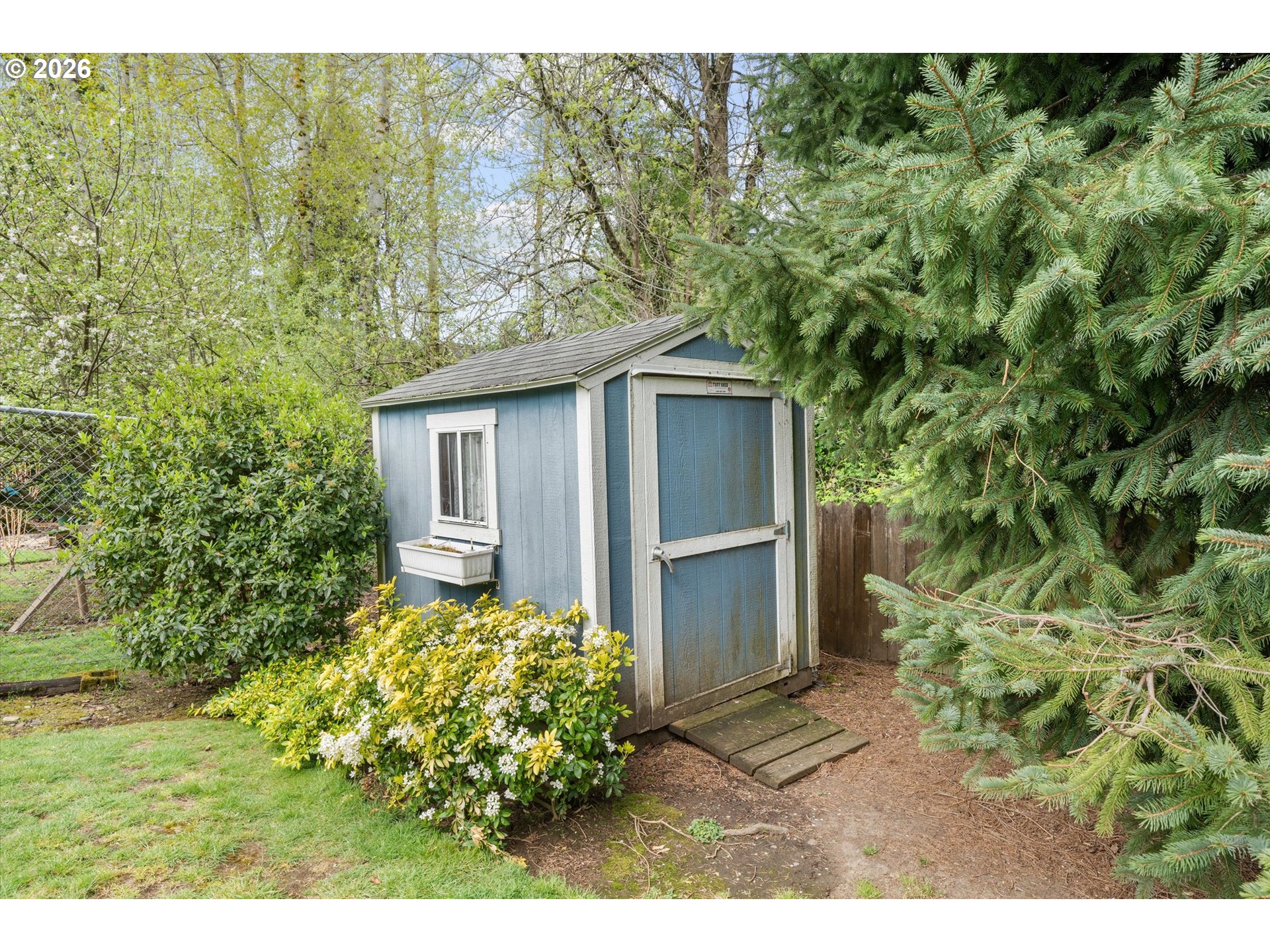 3235 Southeast Silver Springs Road Milwaukie, OR 97222 - Photo 29 of 32 a view of a house with a yard