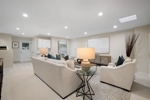 a bedroom with a bed and a cabinets