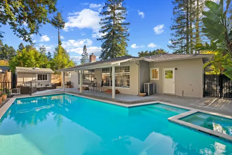 a outdoor living space with furniture and a potted plant